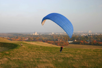 parachute over autumn landscape
