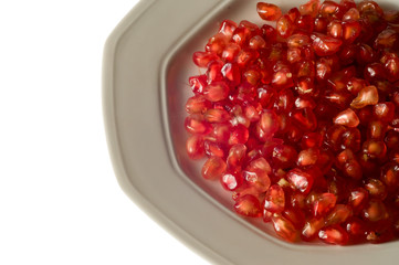 pomegranate grains on dish