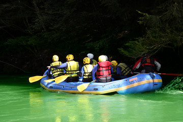 group of kayakers in a boat