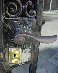 brass and wrought iron door handle