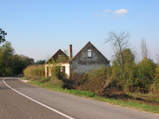 abandoned house in bosnia by the road