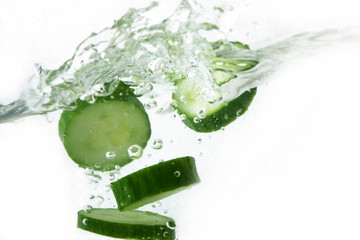  cucumbers splashing in water
