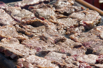 sizzling steak on a barbecue