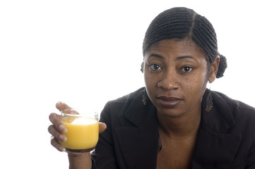 pretty black womanwith orange juice