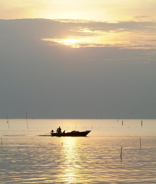 Fishing Boat At Sunset