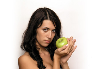 Womand hold and eat apple