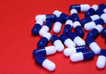 capsules on red