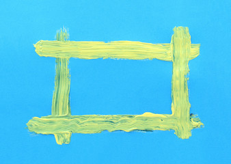 yellow handpainted frame on bright blue paper