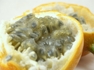 passion fruit seeds in macro on white