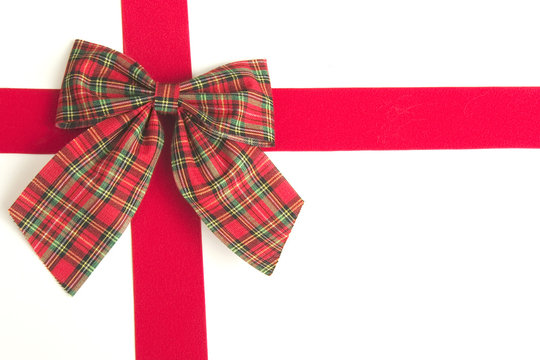 Plaid Bow And Red Ribbon On White Background