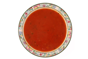 looking down at a bowl of tomato soup