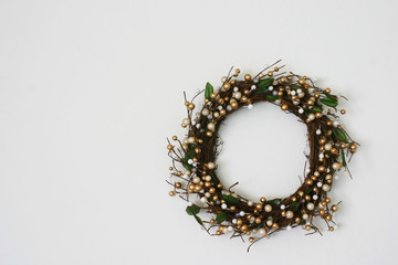 holiday wreath white wall