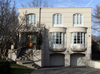 modern two storey house with bay windows