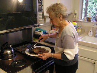 senior female cooking