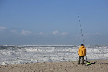 fisherman with yellow raincoat
