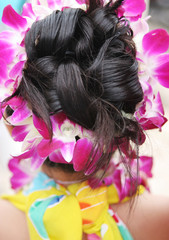 Obraz na płótnie Canvas tropical girl with fancy hairstyle