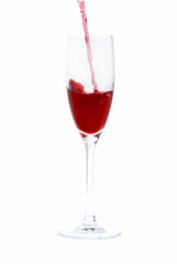 red wine pouring in to the glass