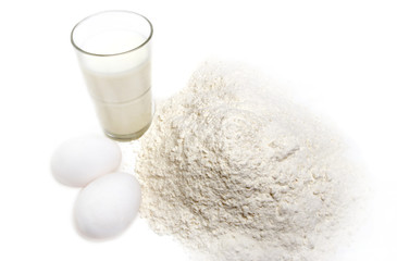 flour, egg and a glass of milk