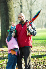 Naklejka premium little pretty child and father