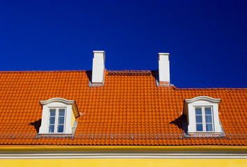 orange roof against blue sky