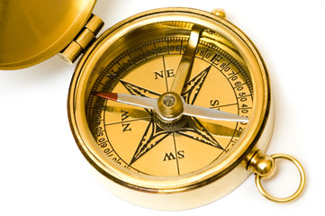 old style brass compass on white background