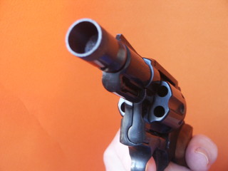 revolver and hand