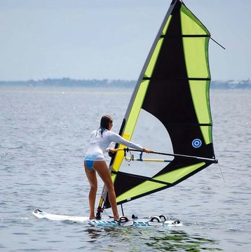 novice lady windsurfer