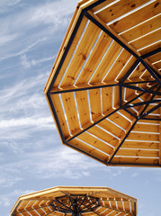 parasols on a cloudy sky