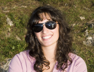 girl smiling with glasses