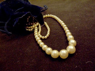 necklace of pearls globes