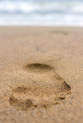 Fototapeta na wymiar footprint on sand #2