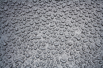 water droplets on a steel surface
