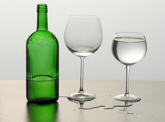 green bottle and glasses