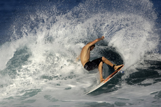 surfer spraying water
