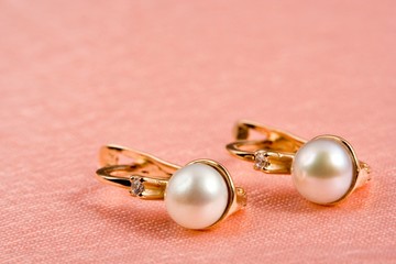 pearl jewelry on rosy folds