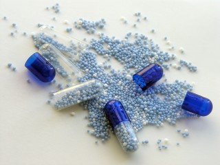 blue capsules and blue potassium granulate