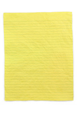 crumpled yellow lined paper