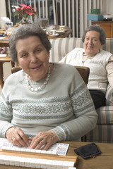 senior woman at the game table