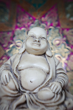 vertical bhudda figurine
