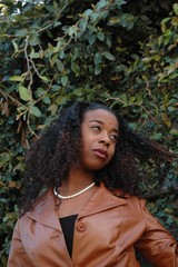 woman in leather coat