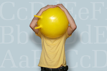 man with yellow ball