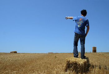 man in a barley field