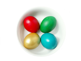 four easter eggs in bowl