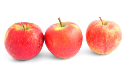 three apples on white