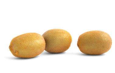 three vivid kiwi fruits on white