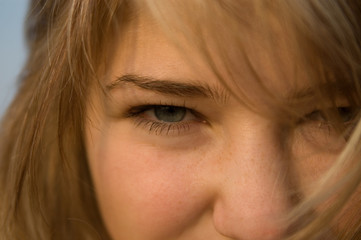 closeup part of face lit by sunset