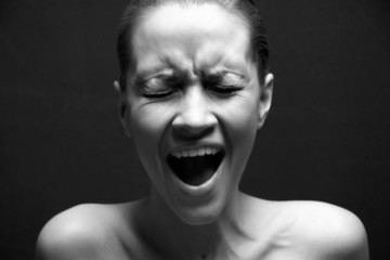 great pain. portrait of loud girl.