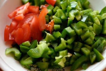 red tomatoes and green capsicum - vegetable