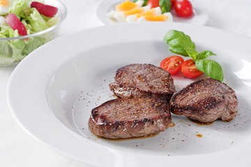 steak with salad