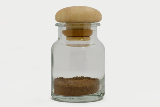 ground nutmeg in a jar
